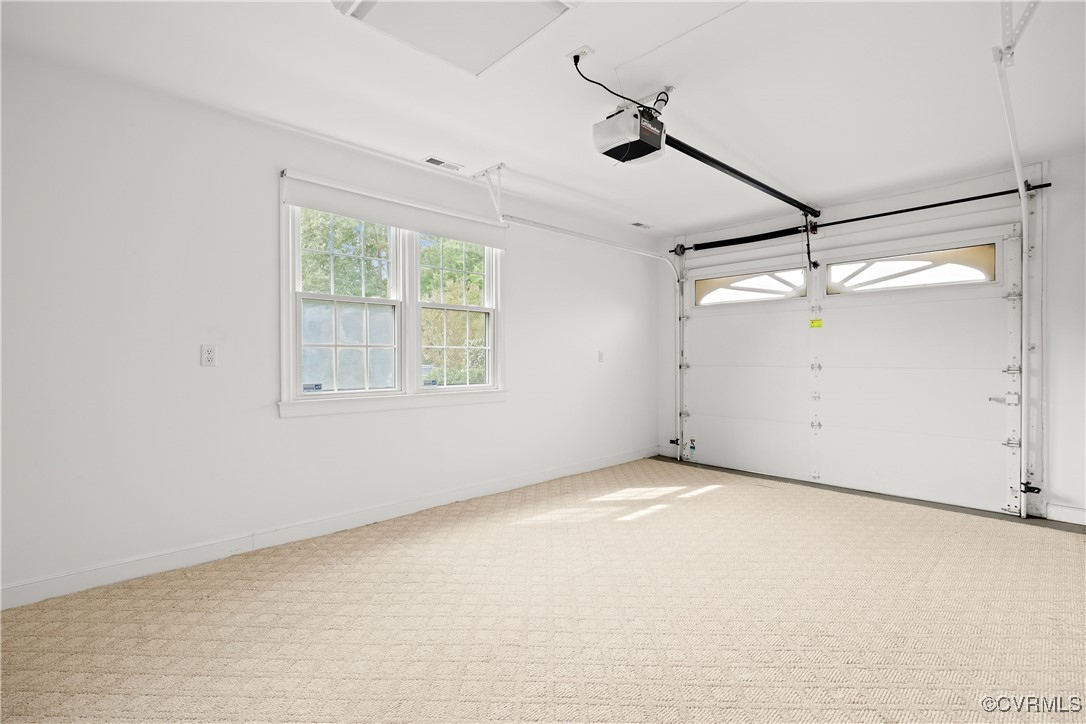 3510 Wood Dale Road Chester, VA 23831 - Photo 28 of 50 an empty room with a window and a ceiling fan