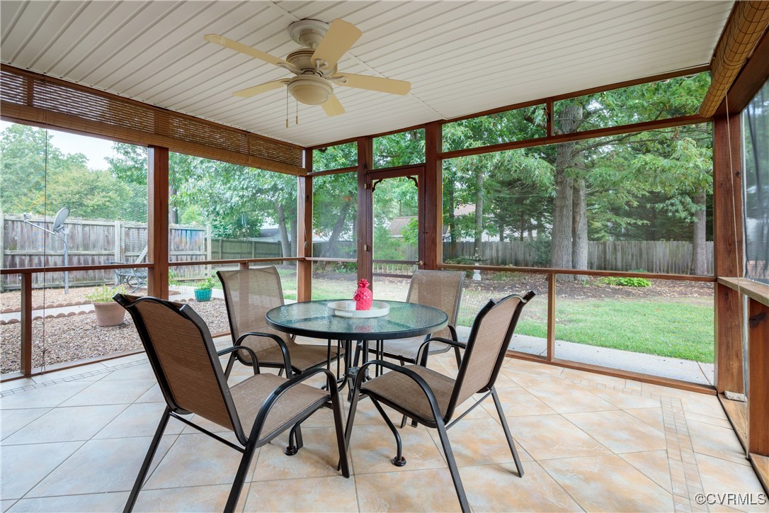 3510 Wood Dale Road Chester, VA 23831 - Photo 31 of 50 a dining room with furniture and a garden view
