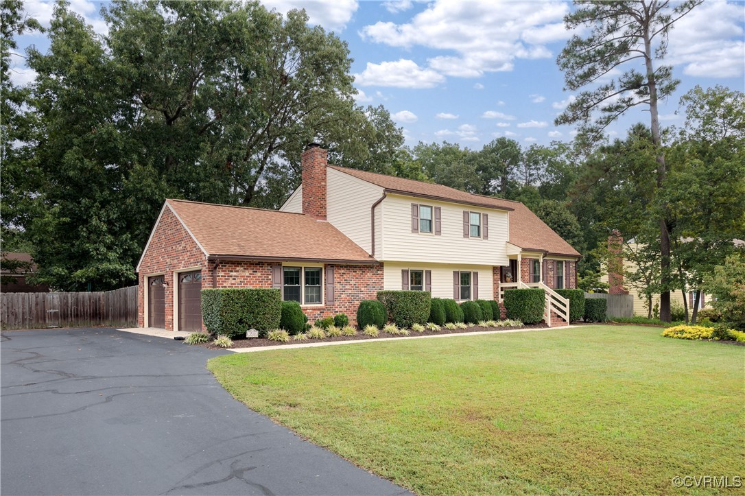 3510 Wood Dale Road Chester, VA 23831 - Photo 50 of 50 a view of house with a big yard and potted plants