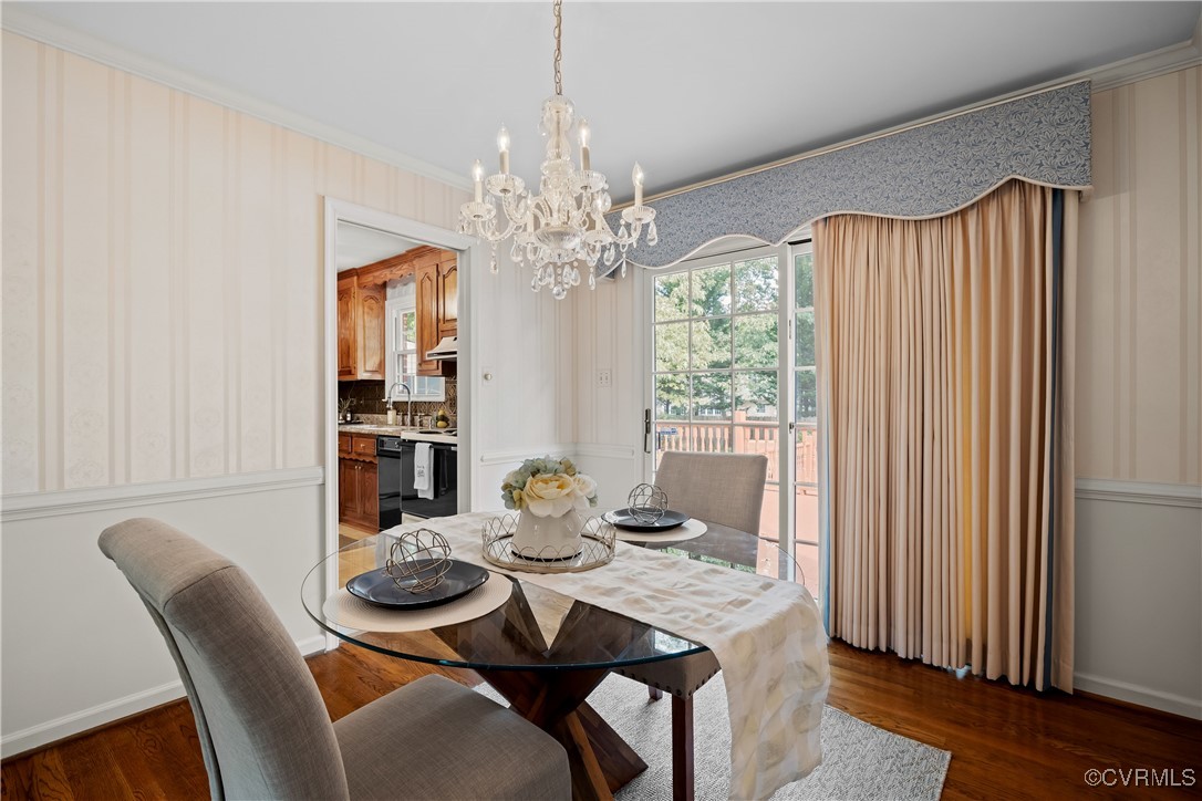 3510 Wood Dale Road Chester, VA 23831 - Photo 9 of 50 a view of a dining room with furniture window and wooden floor
