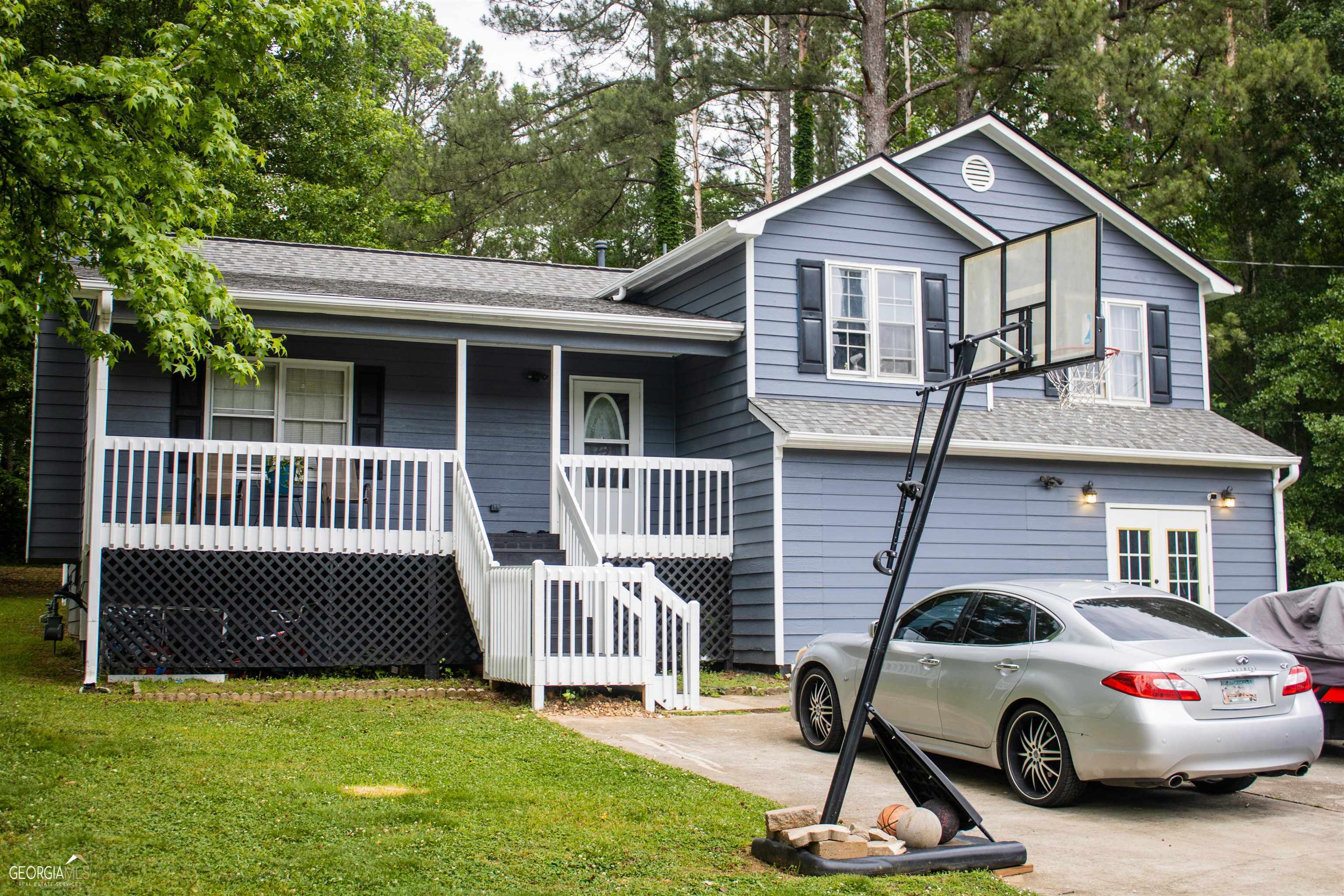 a car parked in front of a house