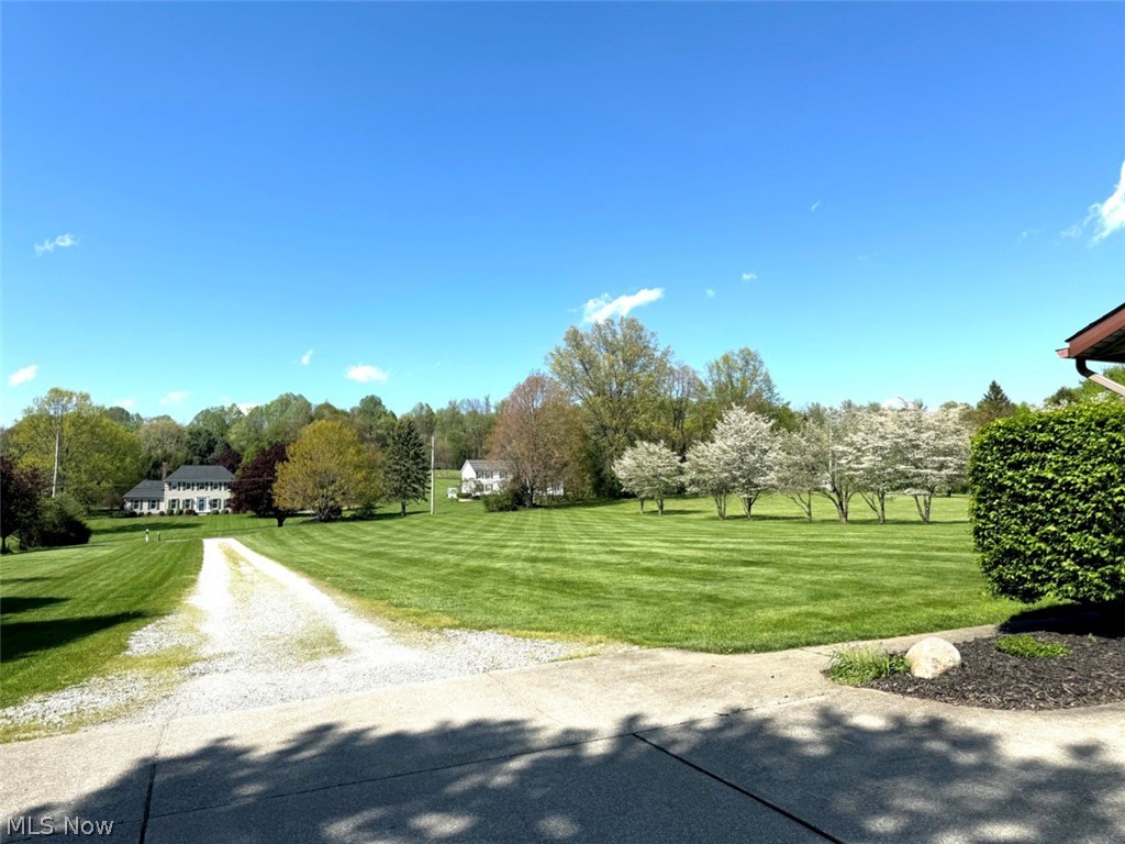 3906 Webb Road Ravenna, OH 44266 - Photo 33 of 33 Expansive green lawn with striped mowing patterns