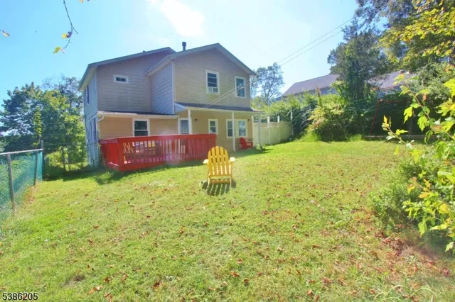 a house view with a garden space