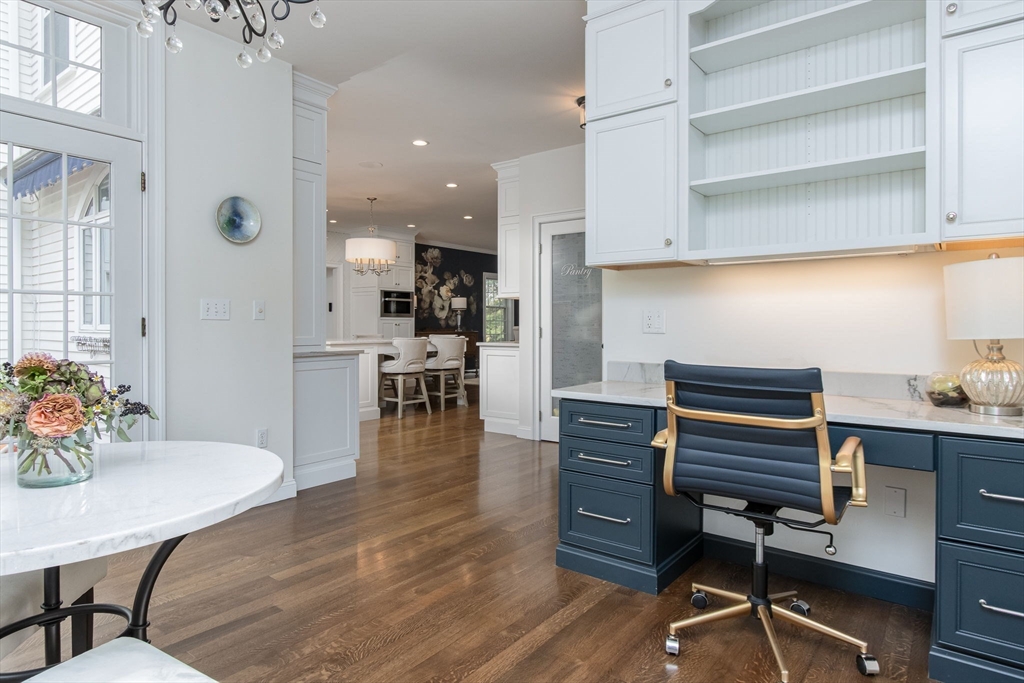 326 Old Ayer Road Groton, MA 01450 - Photo 15 of 42 a view of a dining room with furniture and wooden floor