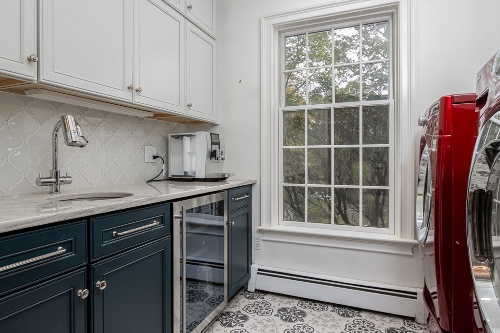 326 Old Ayer Road Groton, MA 01450 - Photo 19 of 42 a kitchen with a sink and a window