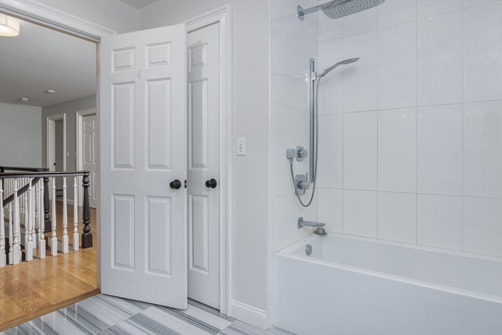 326 Old Ayer Road Groton, MA 01450 - Photo 34 of 42 a bathroom with a bathtub