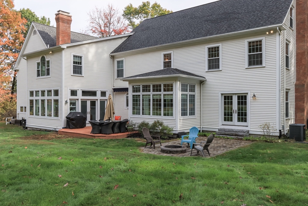 326 Old Ayer Road Groton, MA 01450 - Photo 37 of 42 a house view with a sitting space and garden