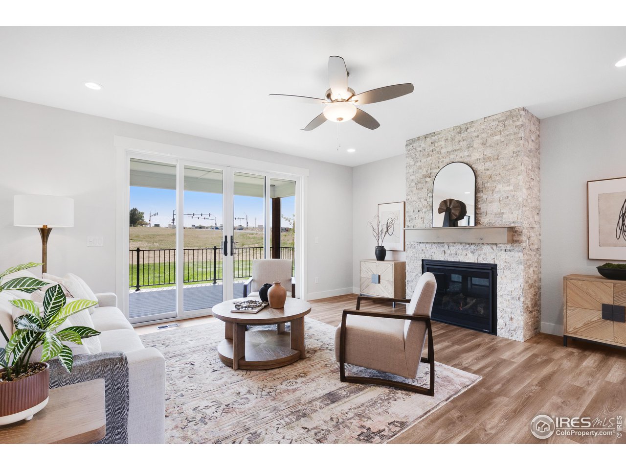 5706 3rd Street Greeley, CO 80634 - Photo 15 of 34 Enjoy the grandness brought by the bi-parting double patio doors