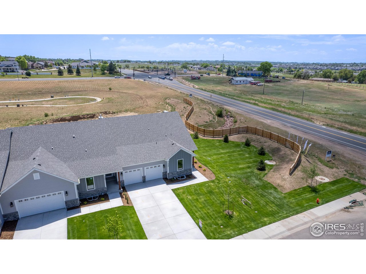 5706 3rd Street Greeley, CO 80634 - Photo 3 of 34 High quality class 4 hail resistant 50-year roof shingles