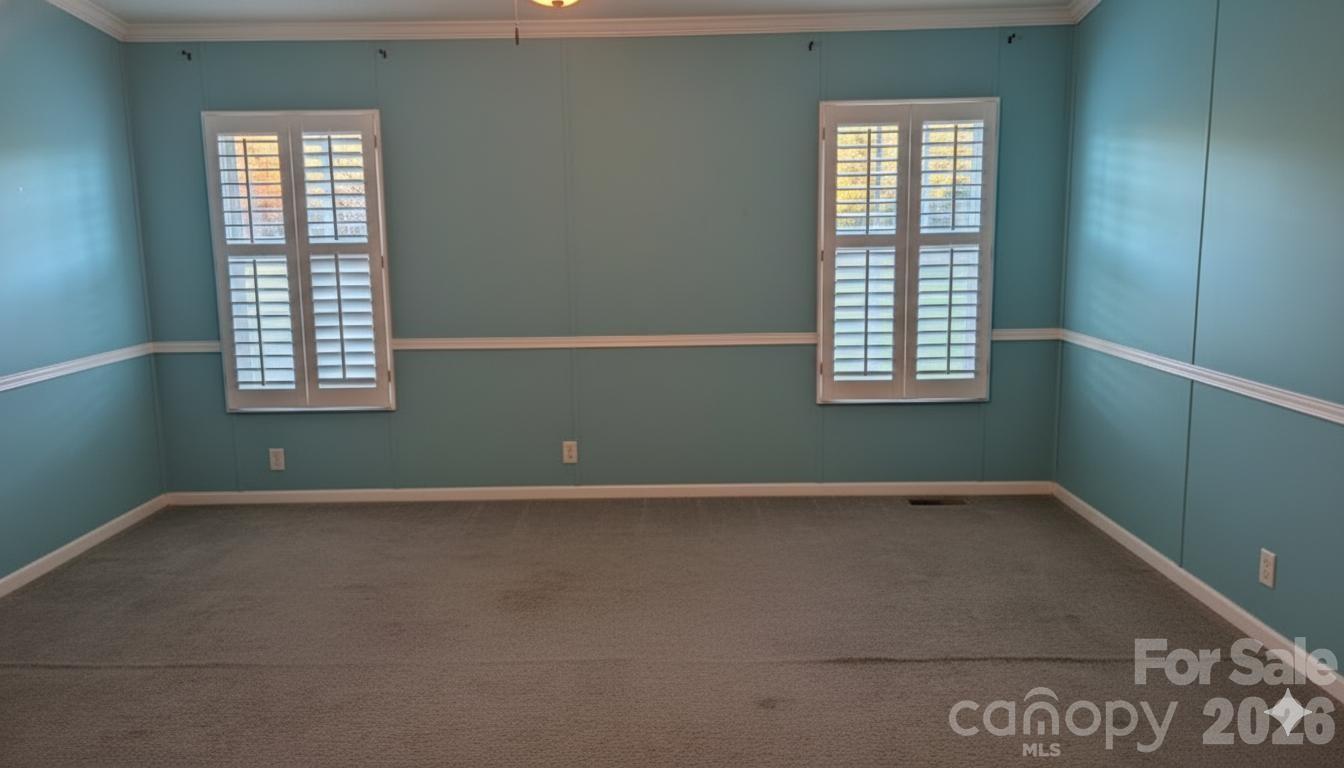 1163 Pit A Tat Road Kershaw, SC 29067 - Photo 11 of 13 an empty room with windows