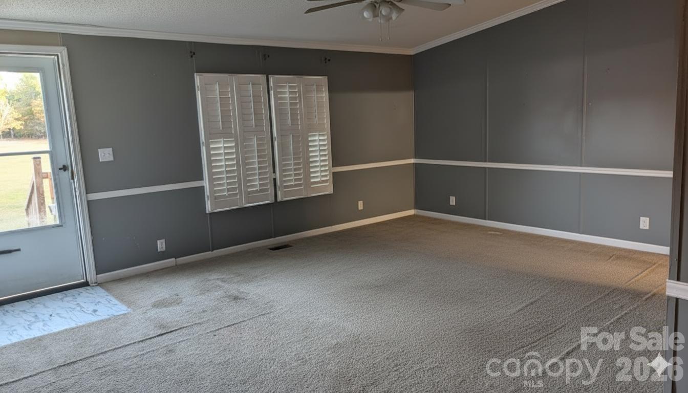 1163 Pit A Tat Road Kershaw, SC 29067 - Photo 7 of 13 an empty room with windows