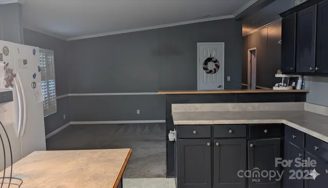 a bathroom with a sink a mirror and a shower