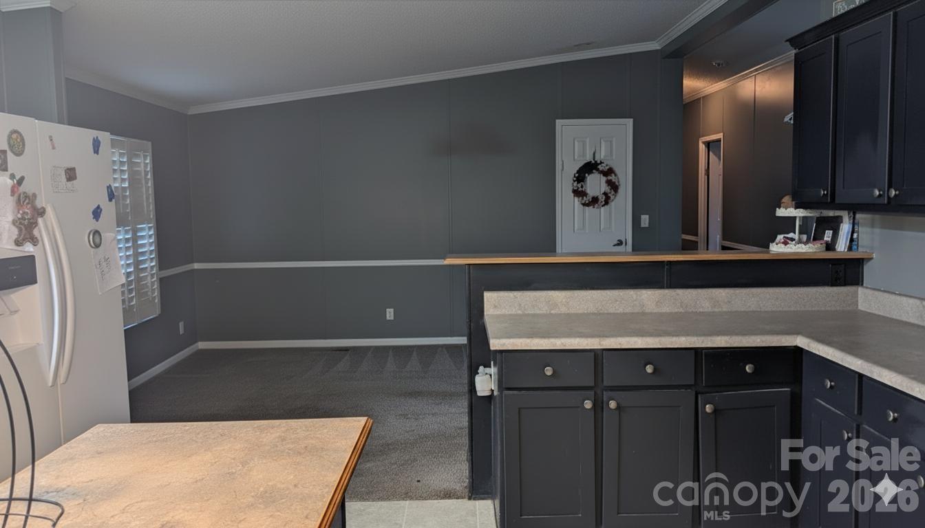 1163 Pit A Tat Road Kershaw, SC 29067 - Photo 10 of 13 a bathroom with a sink a mirror and a shower