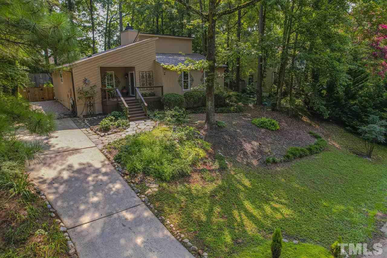 7220 Bluffside Court Raleigh, NC 27615 - Photo 21 of 23 a view of house with background space