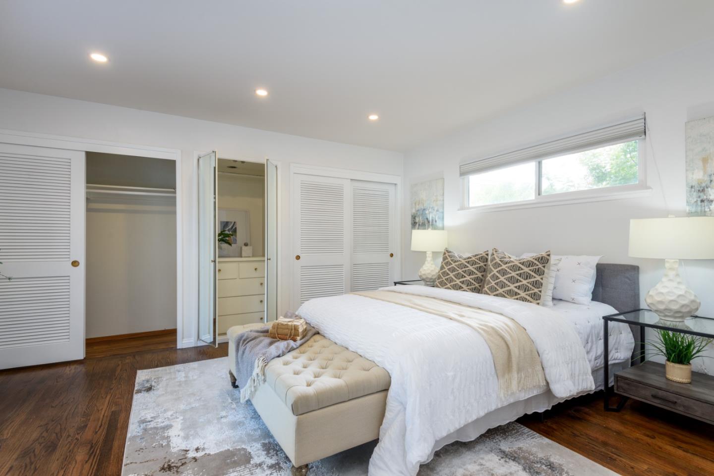 1420 South Mary Avenue Sunnyvale, CA 94087 - Photo 13 of 24 a bedroom with a bed and a couch