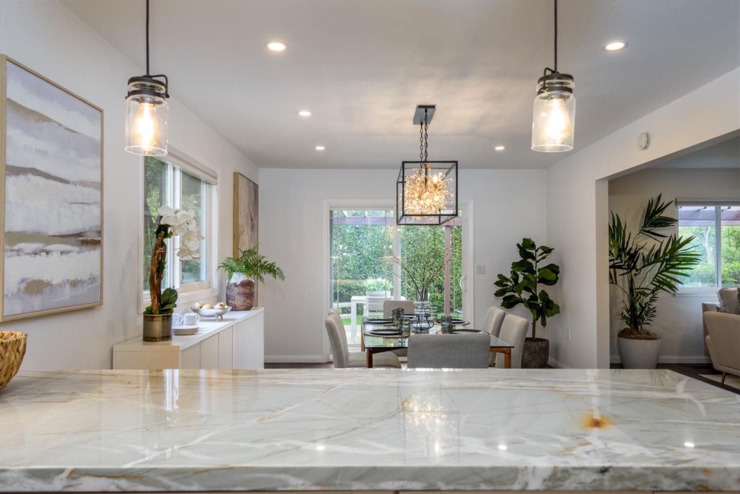 1420 South Mary Avenue Sunnyvale, CA 94087 - Photo 9 of 24 a view of a lobby with furniture and potted plants