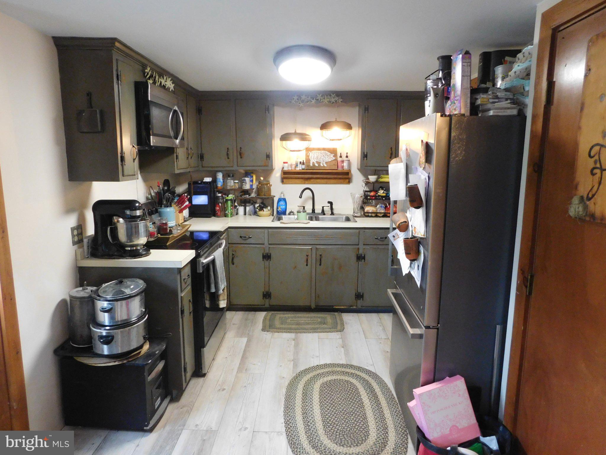 700 Whiskey Road McClure, PA 17841 - Photo 14 of 32 Cozy kitchen with rustic charm.
