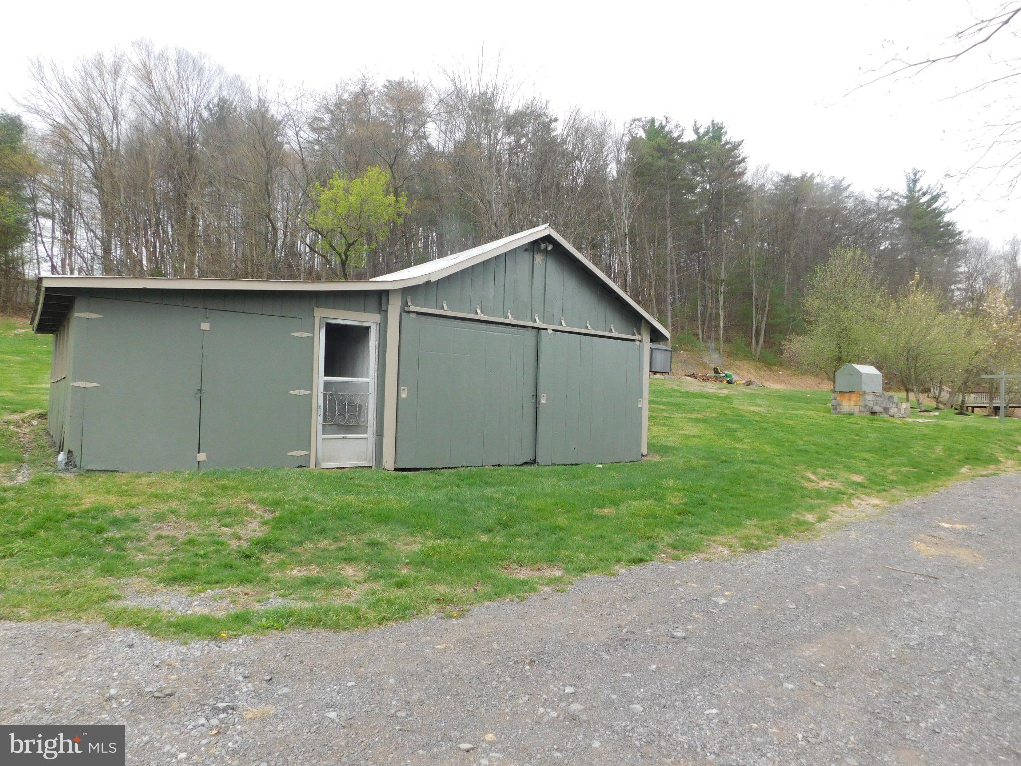700 Whiskey Road McClure, PA 17841 - Photo 3 of 32 Charming shed nestled in nature's embrace.