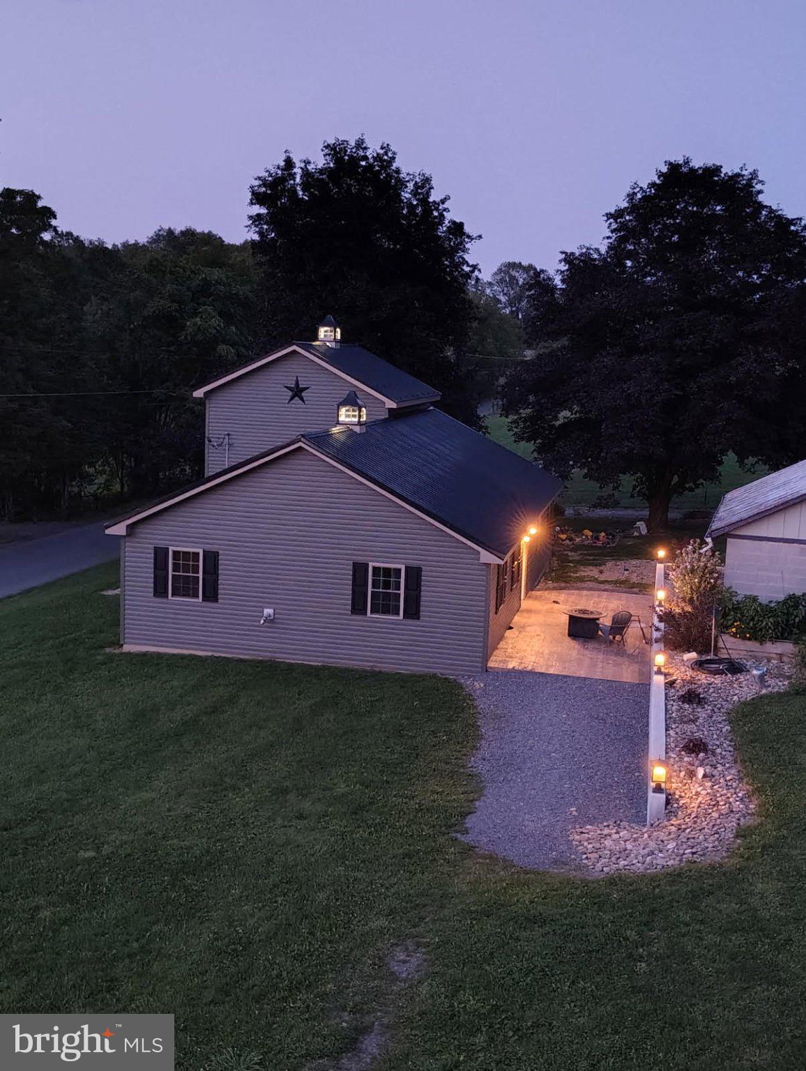700 Whiskey Road McClure, PA 17841 - Photo 5 of 32 Charming home illuminated at dusk.