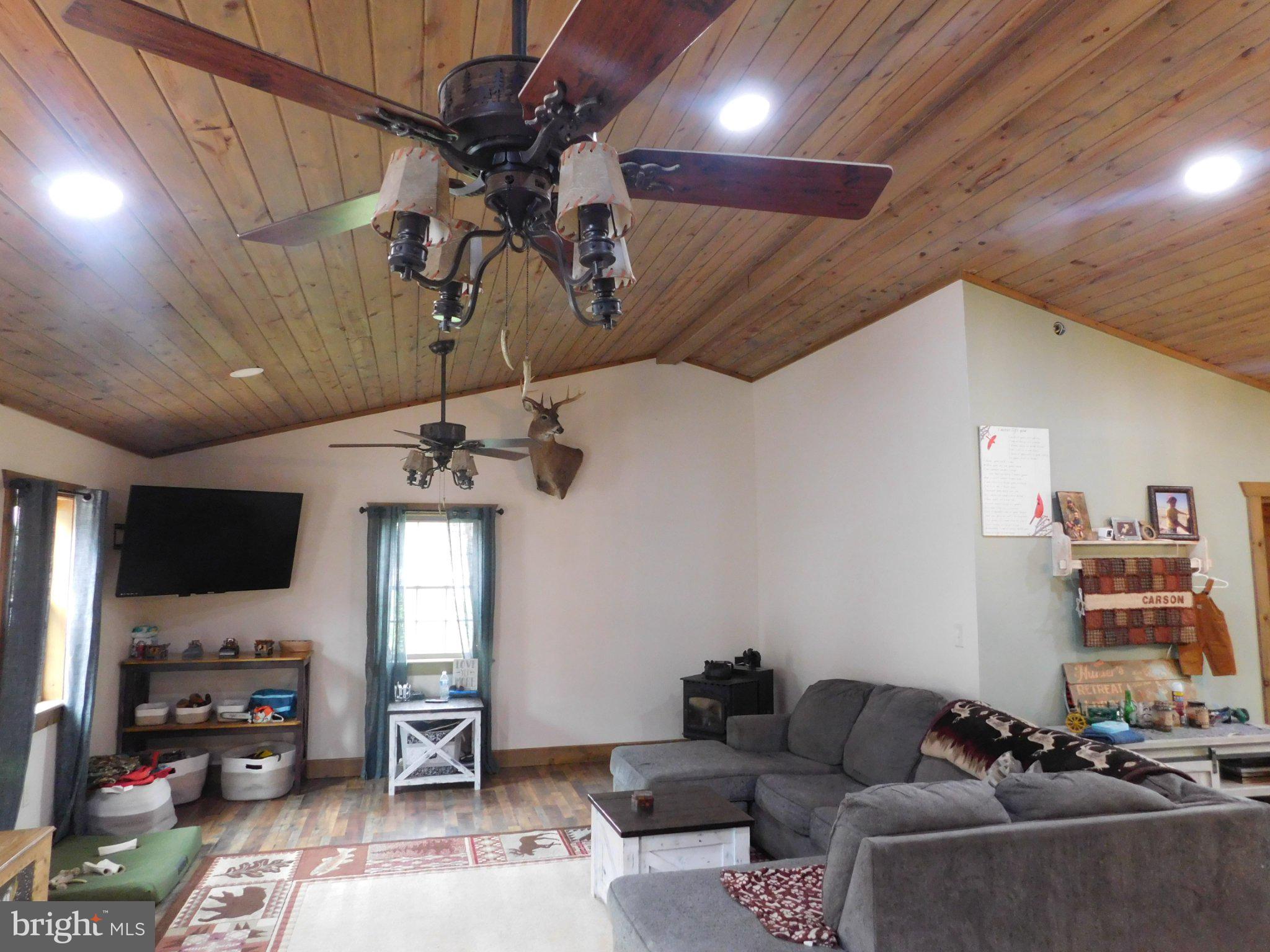700 Whiskey Road McClure, PA 17841 - Photo 9 of 32 Cozy living space with rustic charm.