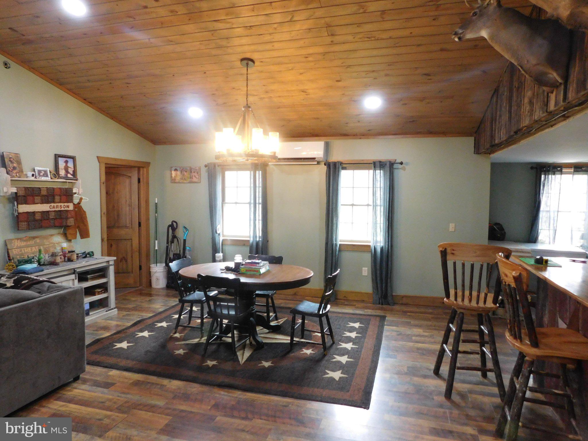 700 Whiskey Road McClure, PA 17841 - Photo 10 of 32 Cozy dining area with rustic charm.