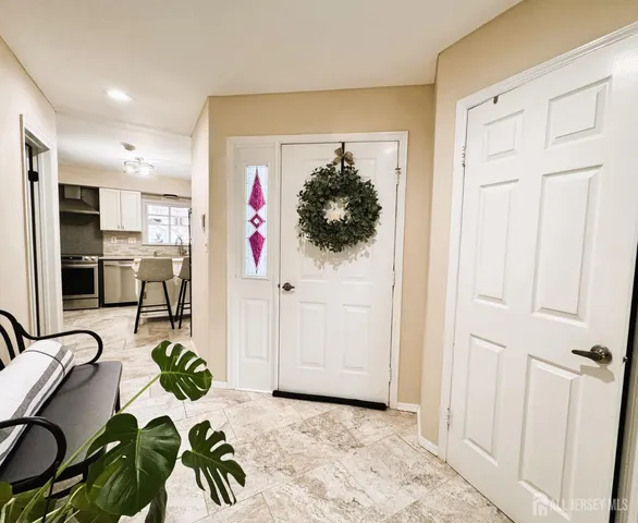 a very nice looking hallway with a couch