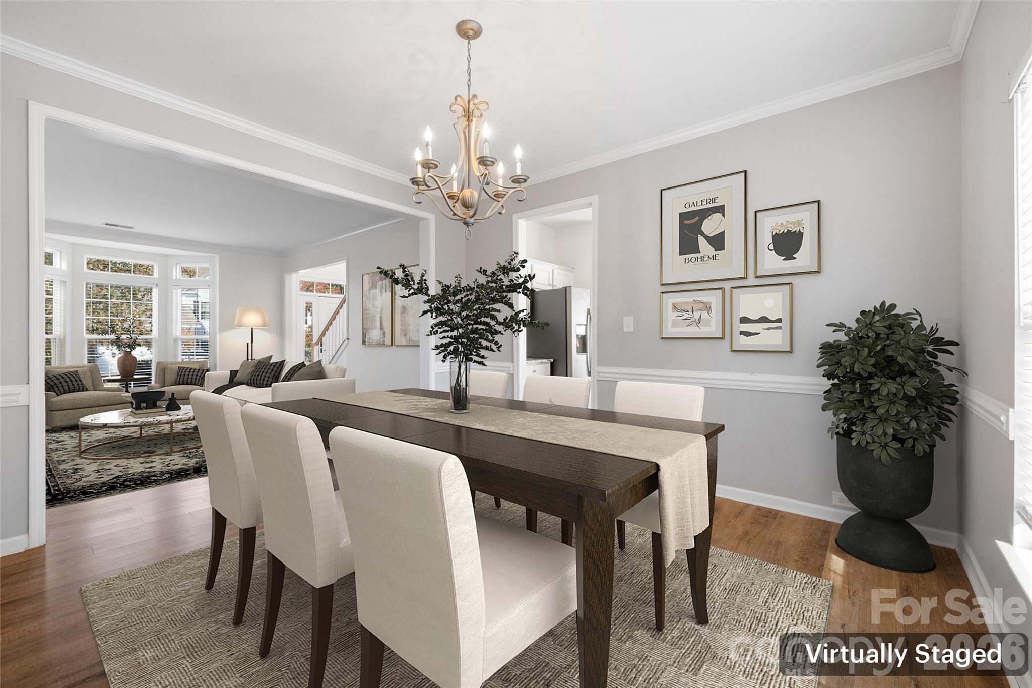 813 Circle Trace Road Monroe, NC 28110 - Photo 13 of 37 a view of a dining room with furniture and chandelier