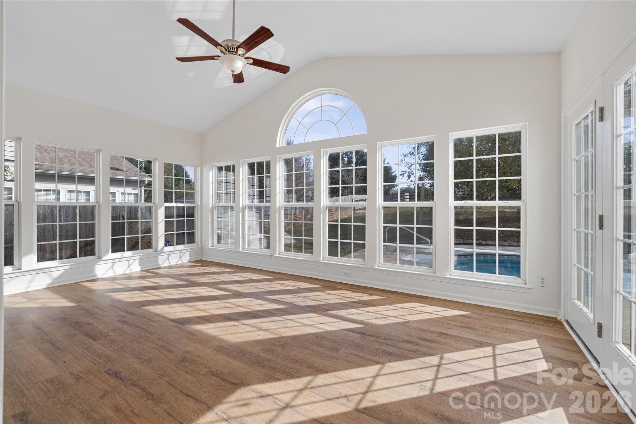 813 Circle Trace Road Monroe, NC 28110 - Photo 18 of 37 a view of an empty room with a window and a ceiling fan