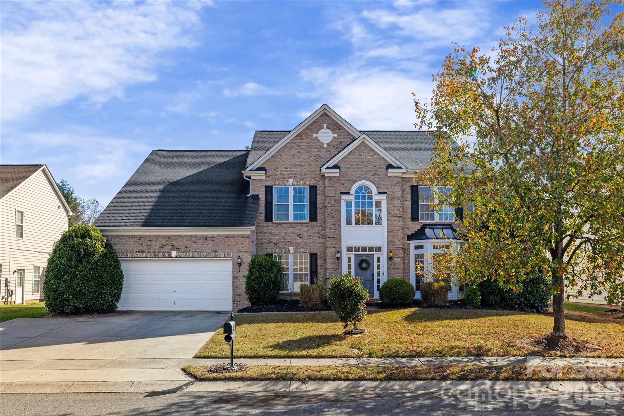 813 Circle Trace Road Monroe, NC 28110 - Photo 2 of 37 a front view of a house with garden