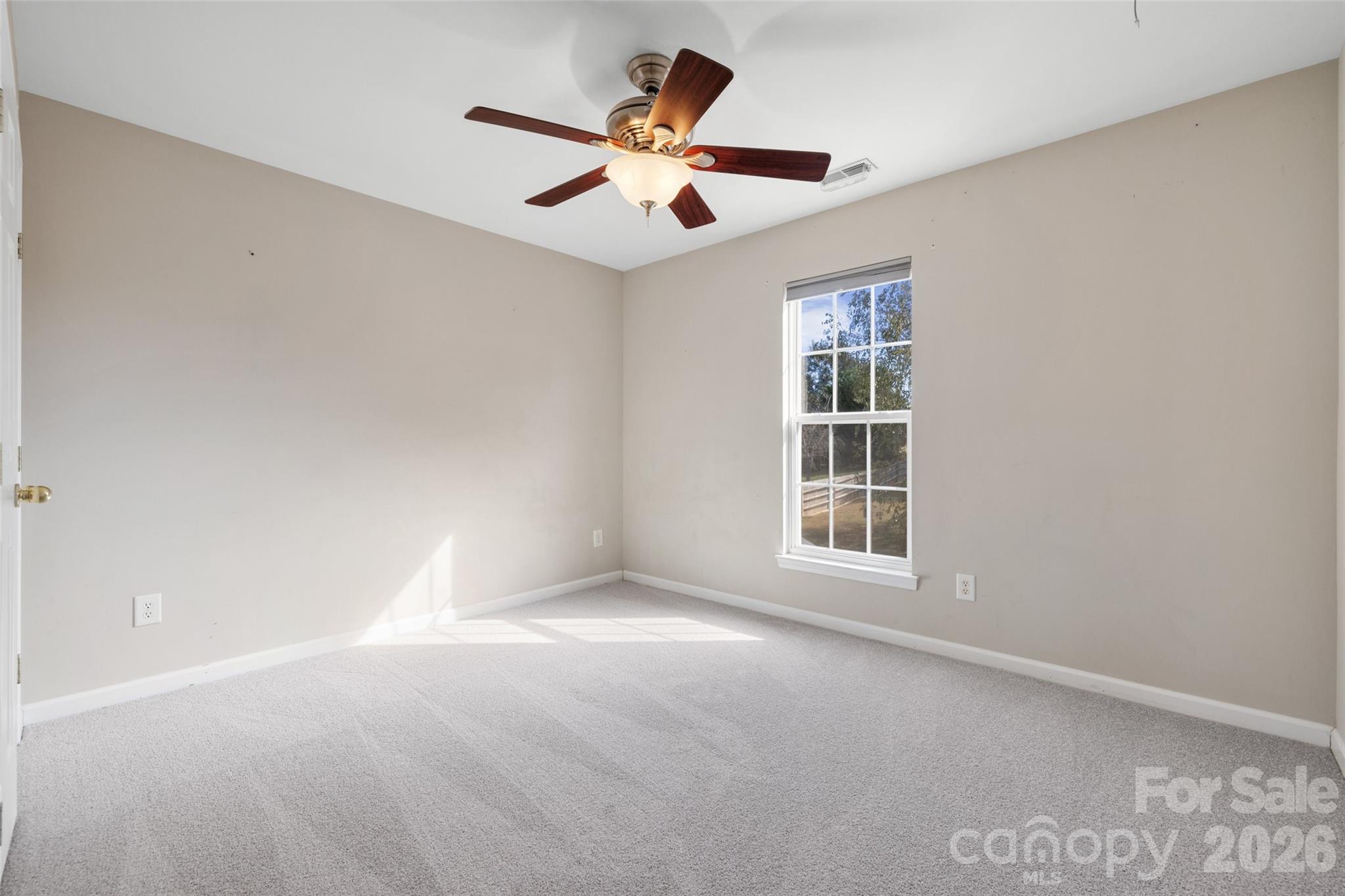 813 Circle Trace Road Monroe, NC 28110 - Photo 26 of 37 a view of an empty room with a window
