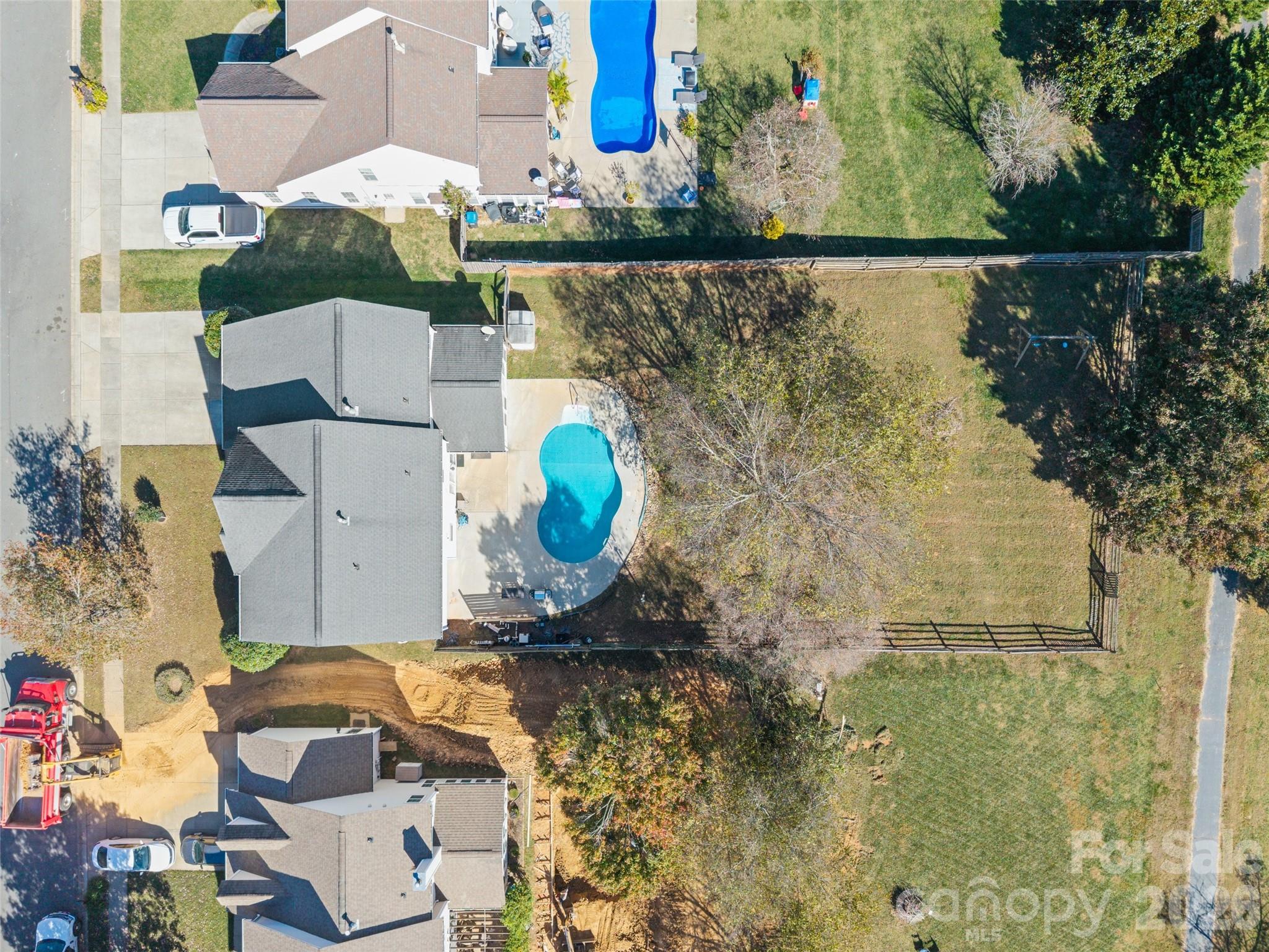 813 Circle Trace Road Monroe, NC 28110 - Photo 34 of 37 an aerial view of a house with a swimming pool
