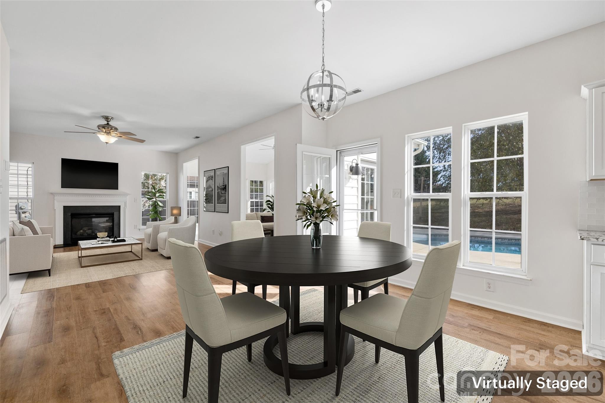 813 Circle Trace Road Monroe, NC 28110 - Photo 8 of 37 a view of a dining room with furniture window and wooden floor