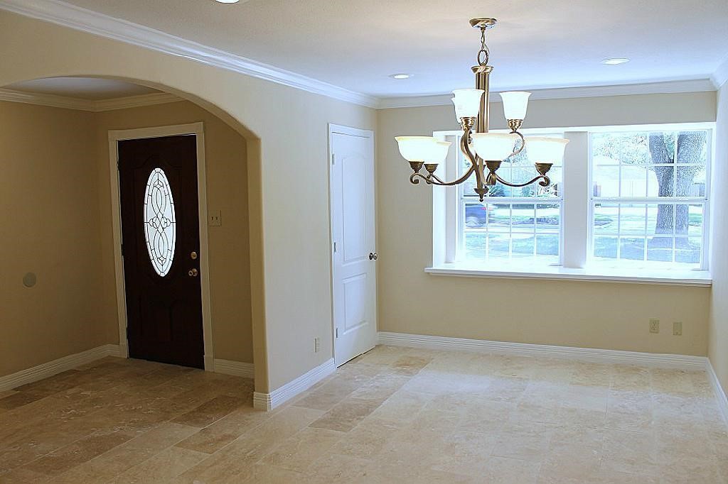 5738 Willowbend Boulevard Houston, TX 77096 - Photo 6 of 28 a view of entryway and chandelier