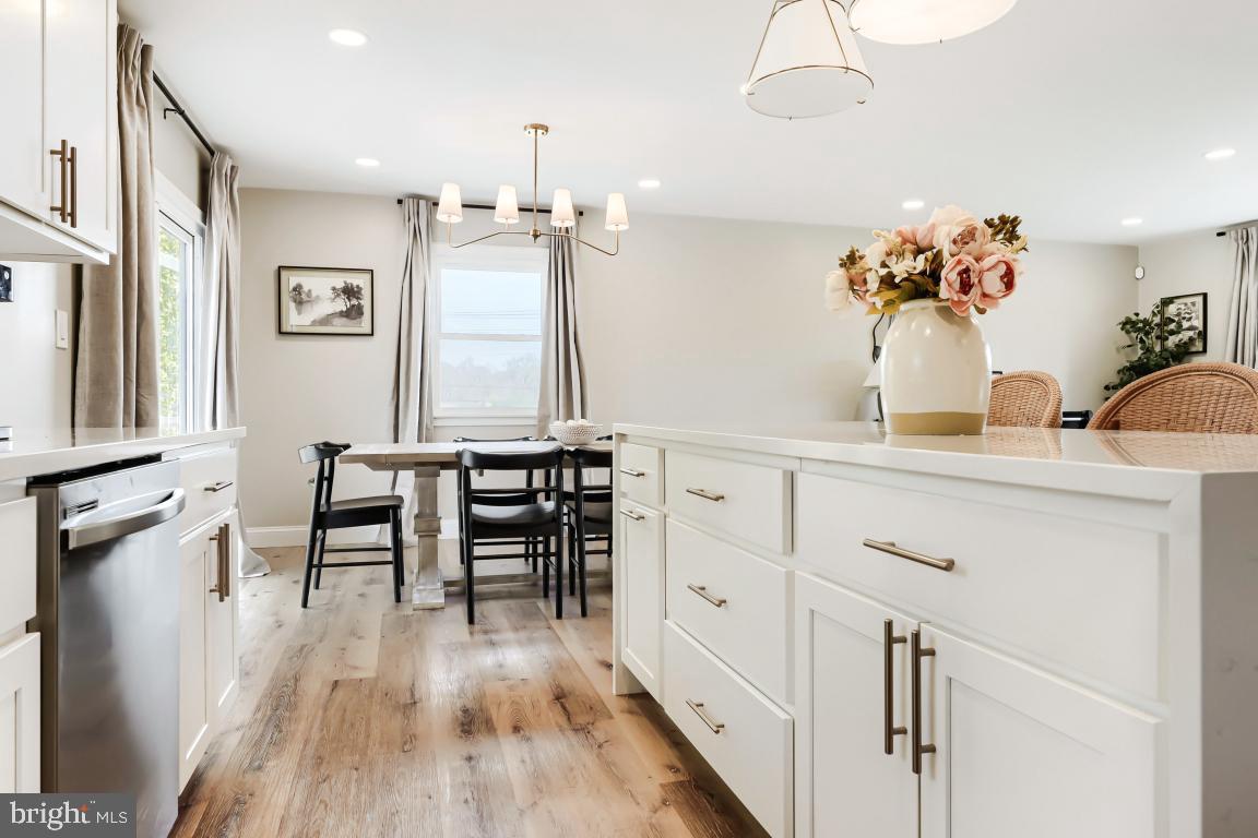 600 East Macphail Road Bel Air, MD 21014 - Photo 11 of 37 a view of a dining room with furniture and wooden floor