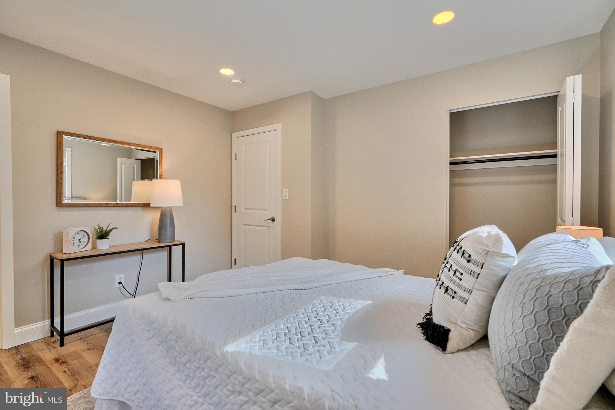 600 East Macphail Road Bel Air, MD 21014 - Photo 19 of 37 a bedroom with a bed and a lamp