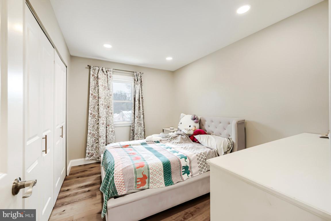 600 East Macphail Road Bel Air, MD 21014 - Photo 23 of 37 a bedroom with a bed and a table