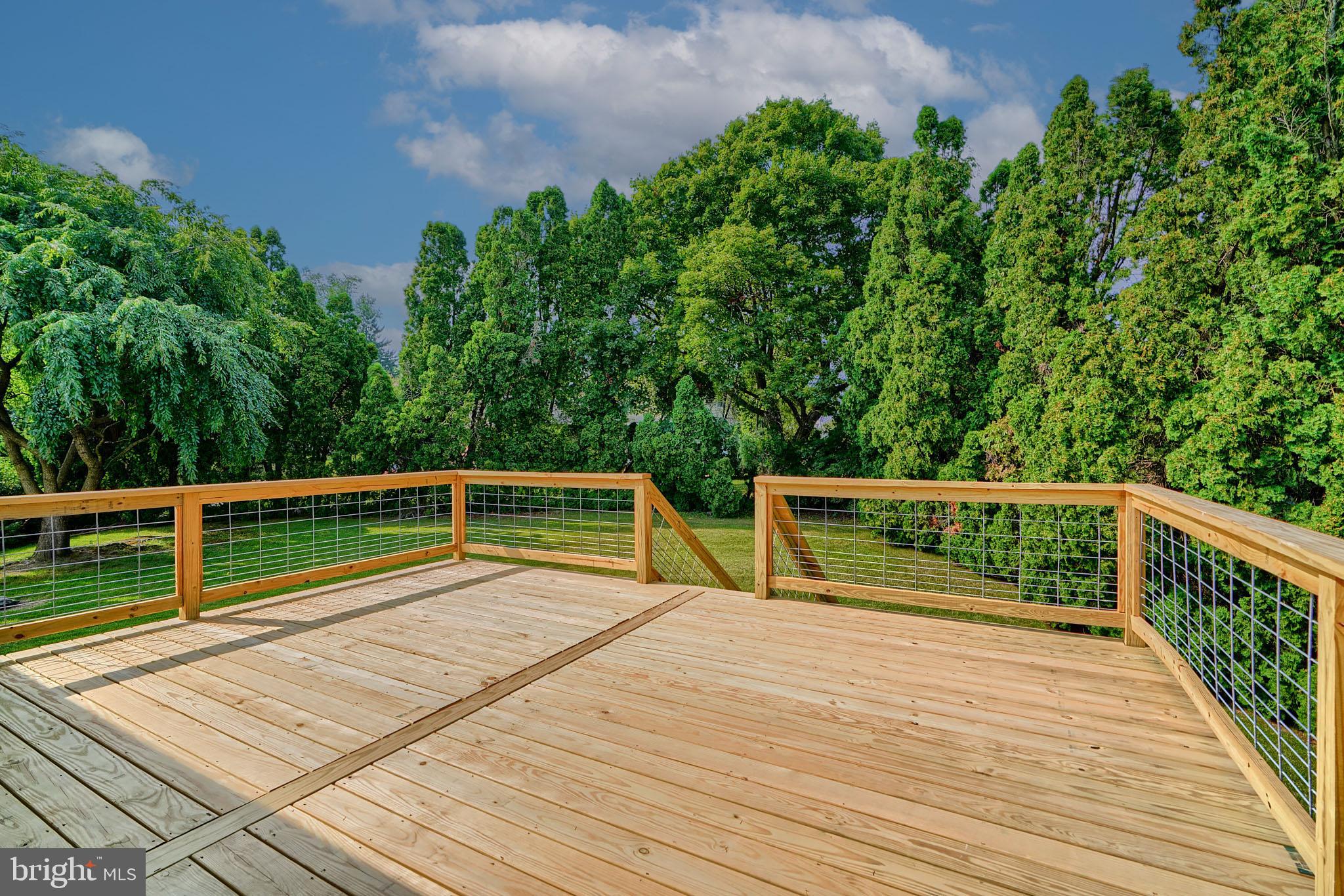 600 East Macphail Road Bel Air, MD 21014 - Photo 3 of 37 a view of balcony with wooden floor and fence