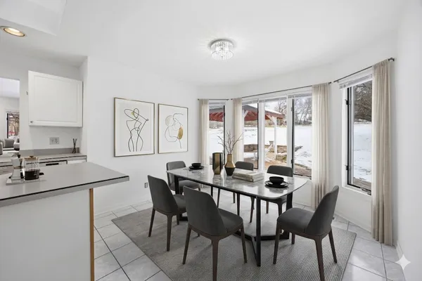 a kitchen with stainless steel appliances a refrigerator stove microwave and cabinets