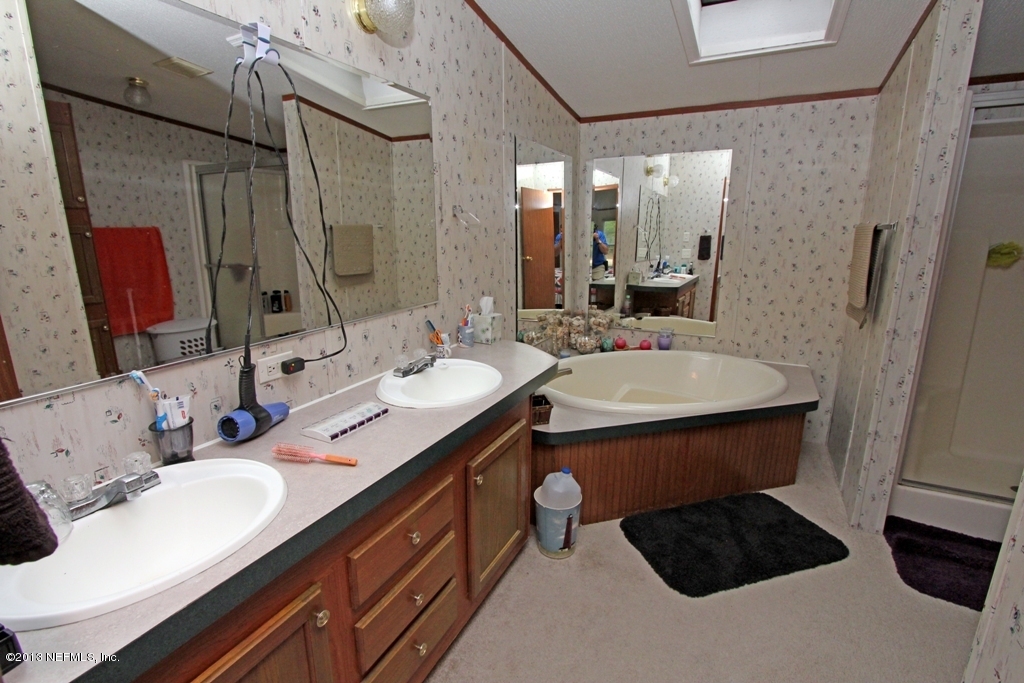 2073 Gentlebreeze Road Middleburg, FL 32068 - Photo 21 of 31 MasterBathroom1