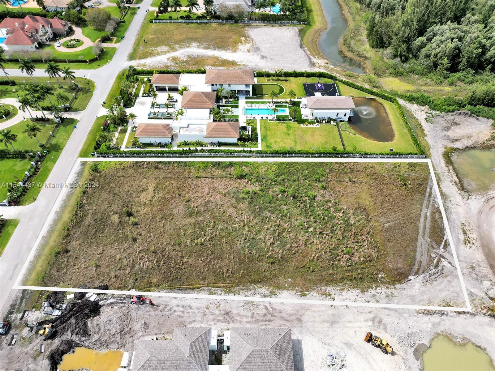 16745 Stratford Court Southwest Ranches, FL 33331 - Photo 14 of 26 a view of swimming pool with a yard