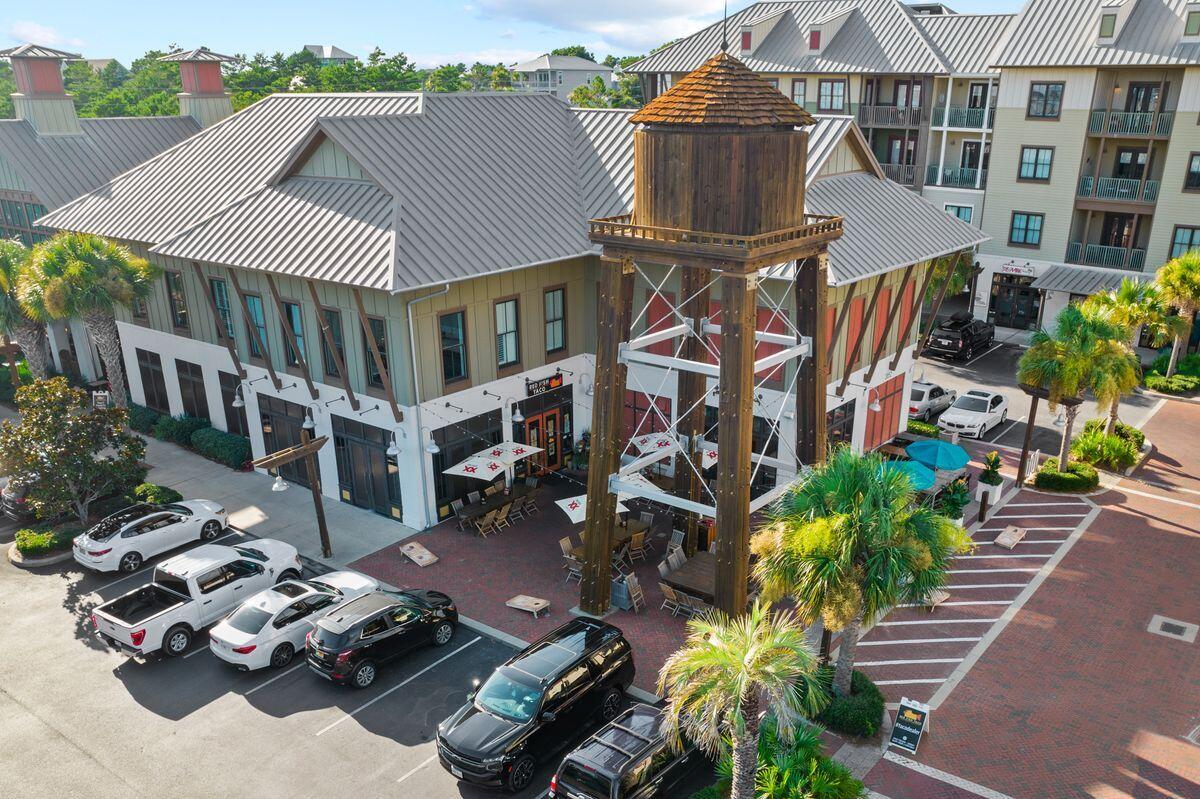 Lot 4 Blue Mountain Road Santa Rosa Beach, FL 32459 - Photo 12 of 16 a aerial view of a house with a yard and balcony