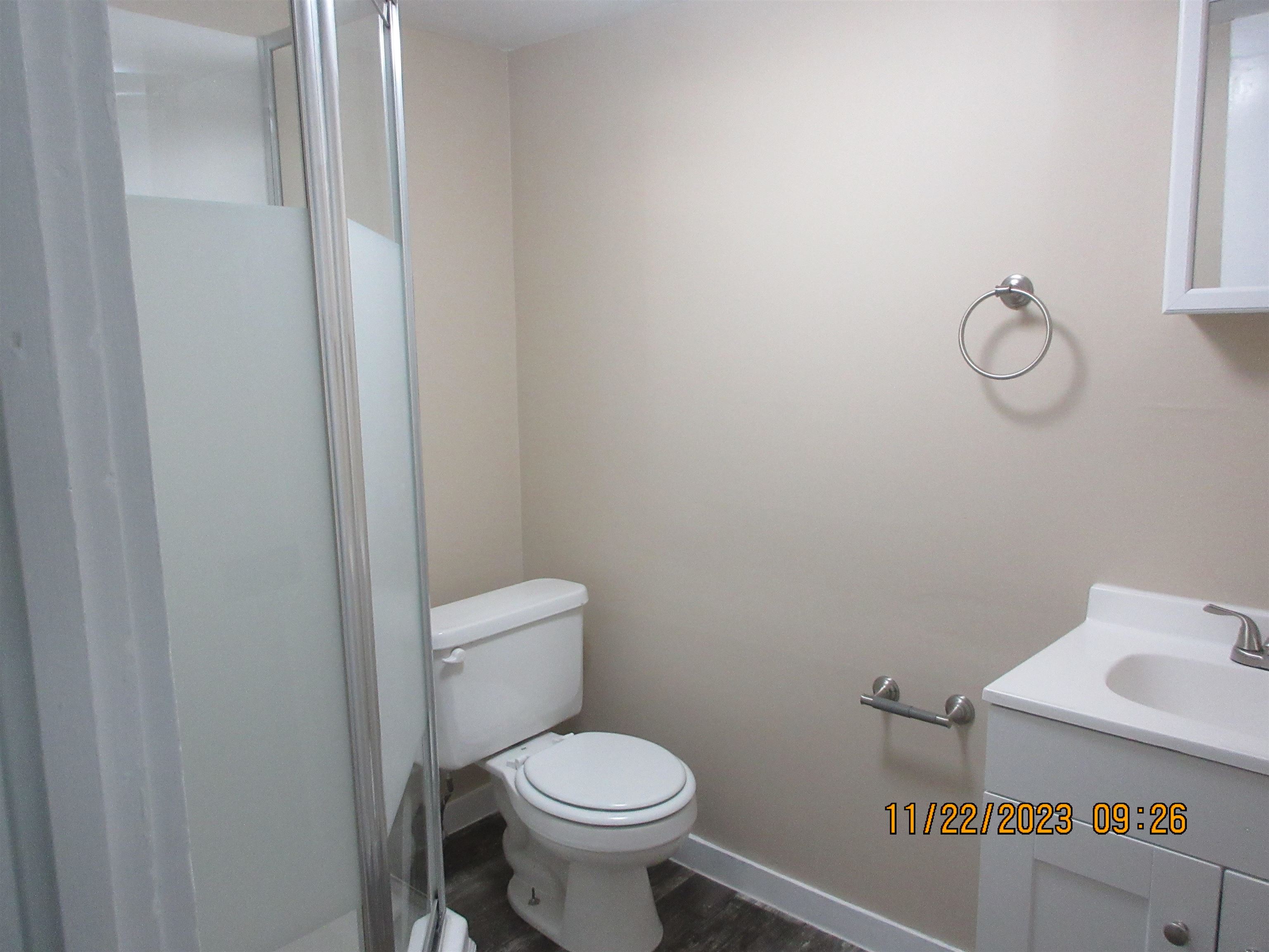 4036 Concord Road Gates, TN 38037 - Photo 13 of 19 a white toilet sitting next to a shower