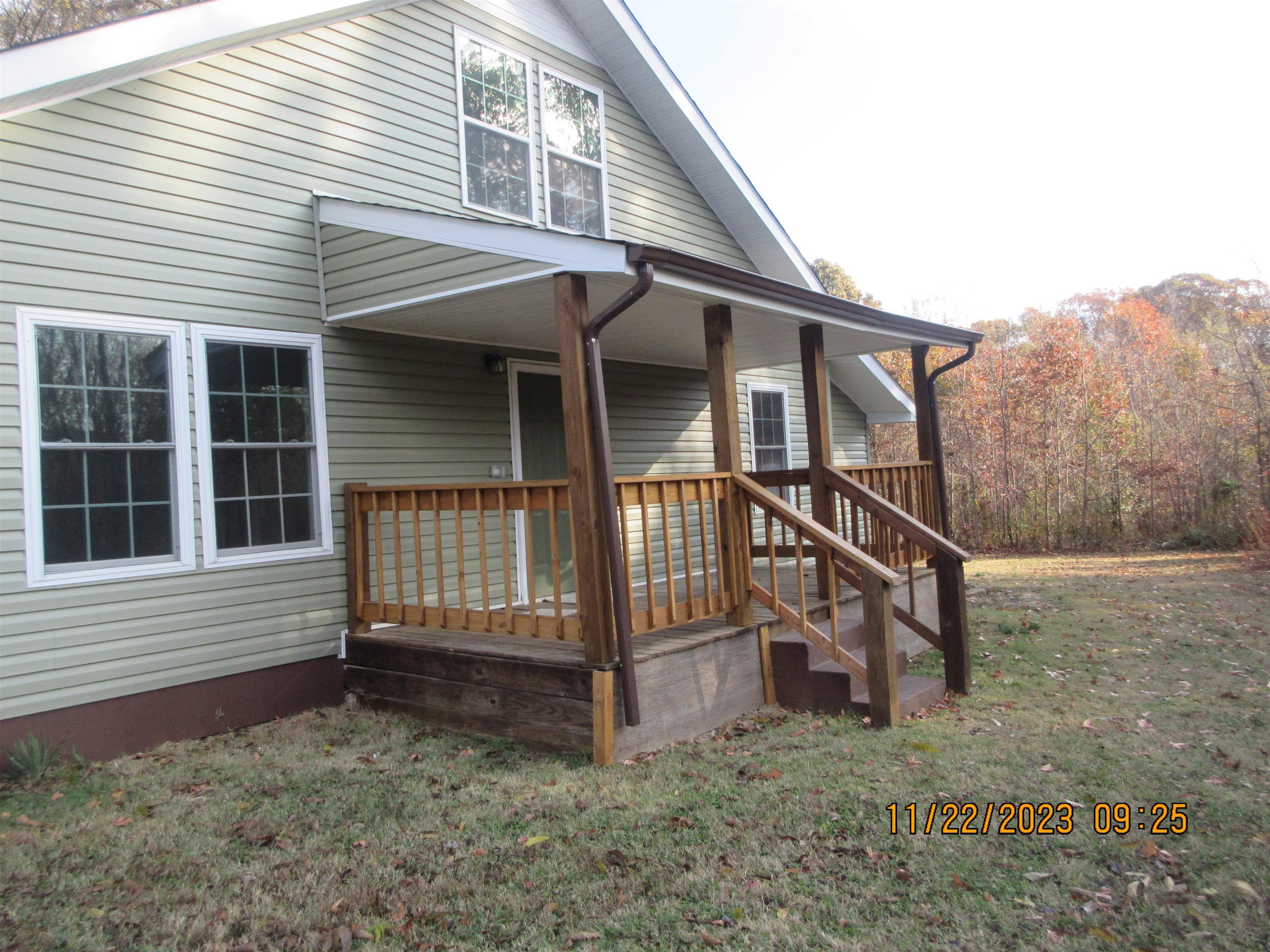 4036 Concord Road Gates, TN 38037 - Photo 15 of 19 a view of a house with a yard and wooden fence