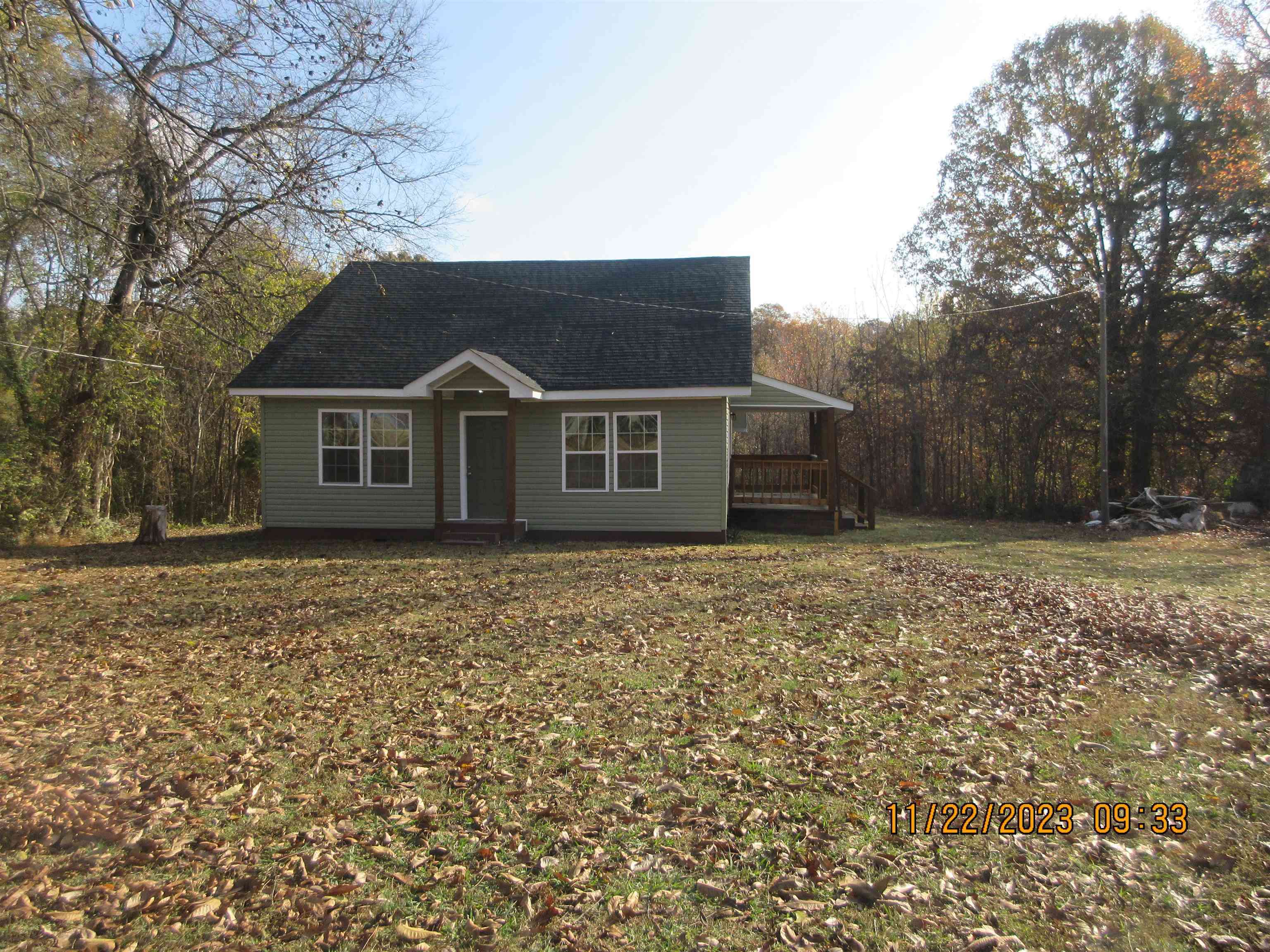 4036 Concord Road Gates, TN 38037 - Photo 19 of 19 a house with trees in the background