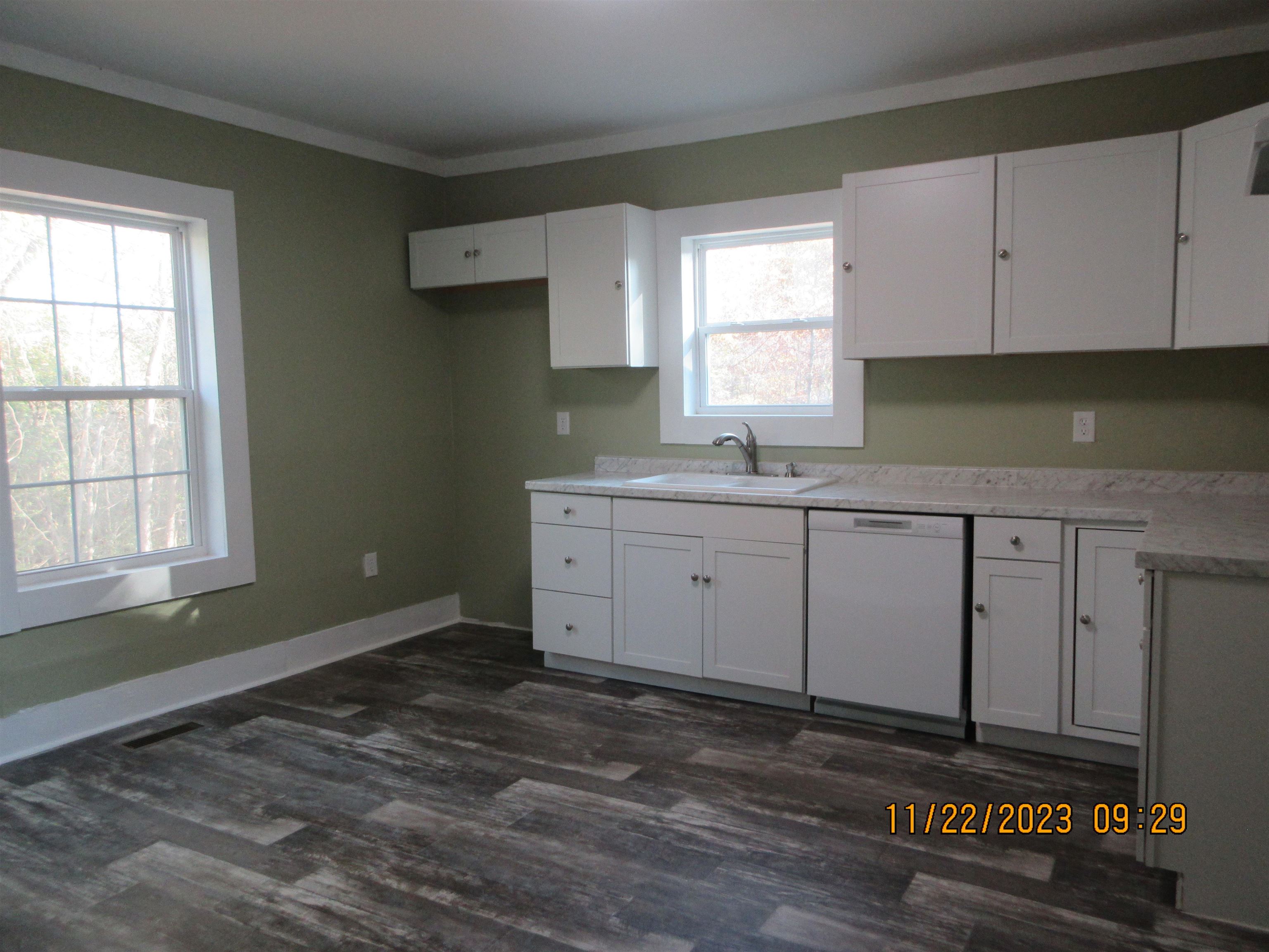 4036 Concord Road Gates, TN 38037 - Photo 3 of 19 a kitchen with a sink cabinets and window