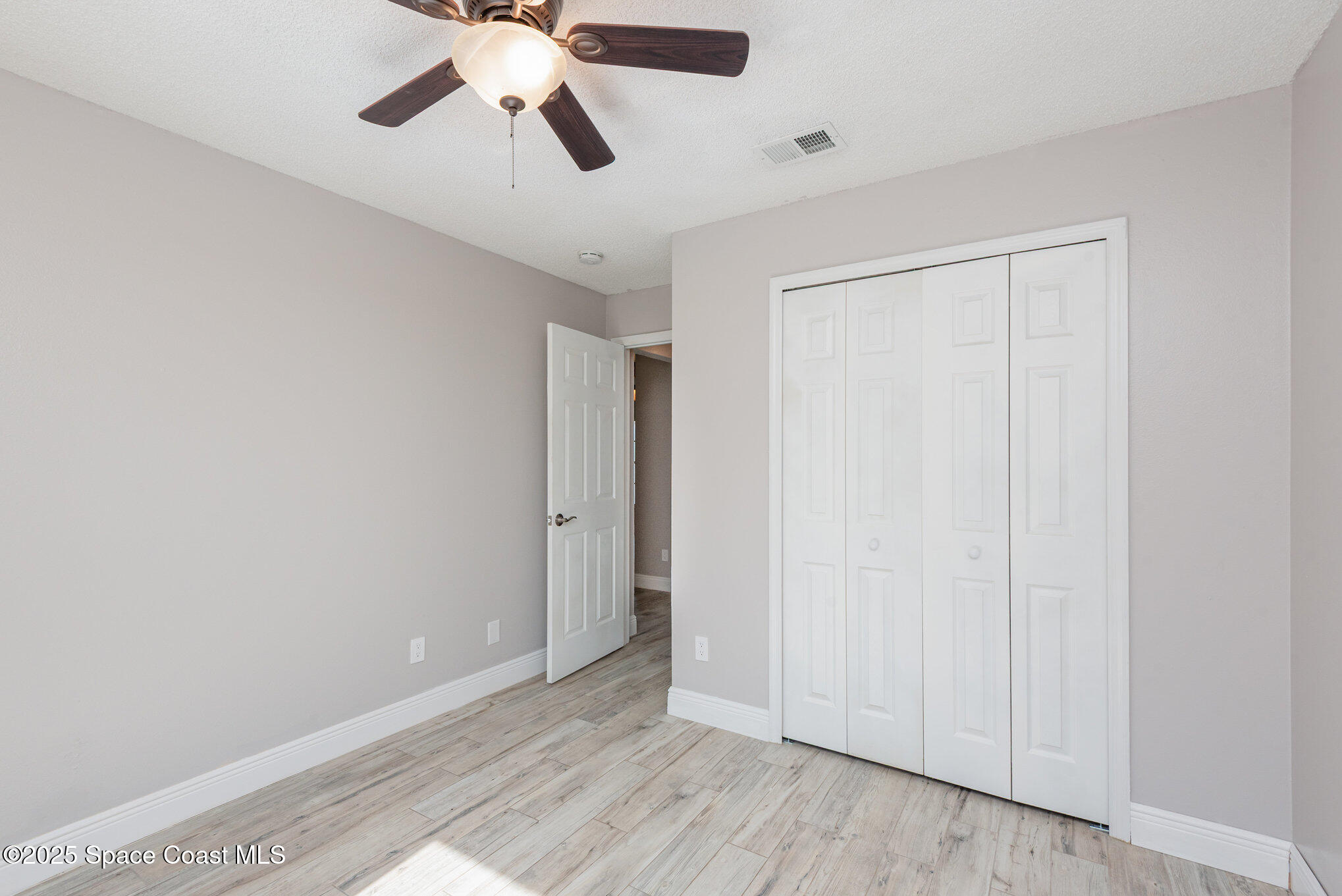 1045 Jacaranda Circle Rockledge, FL 32955 - Photo 17 of 32 a view of an empty room