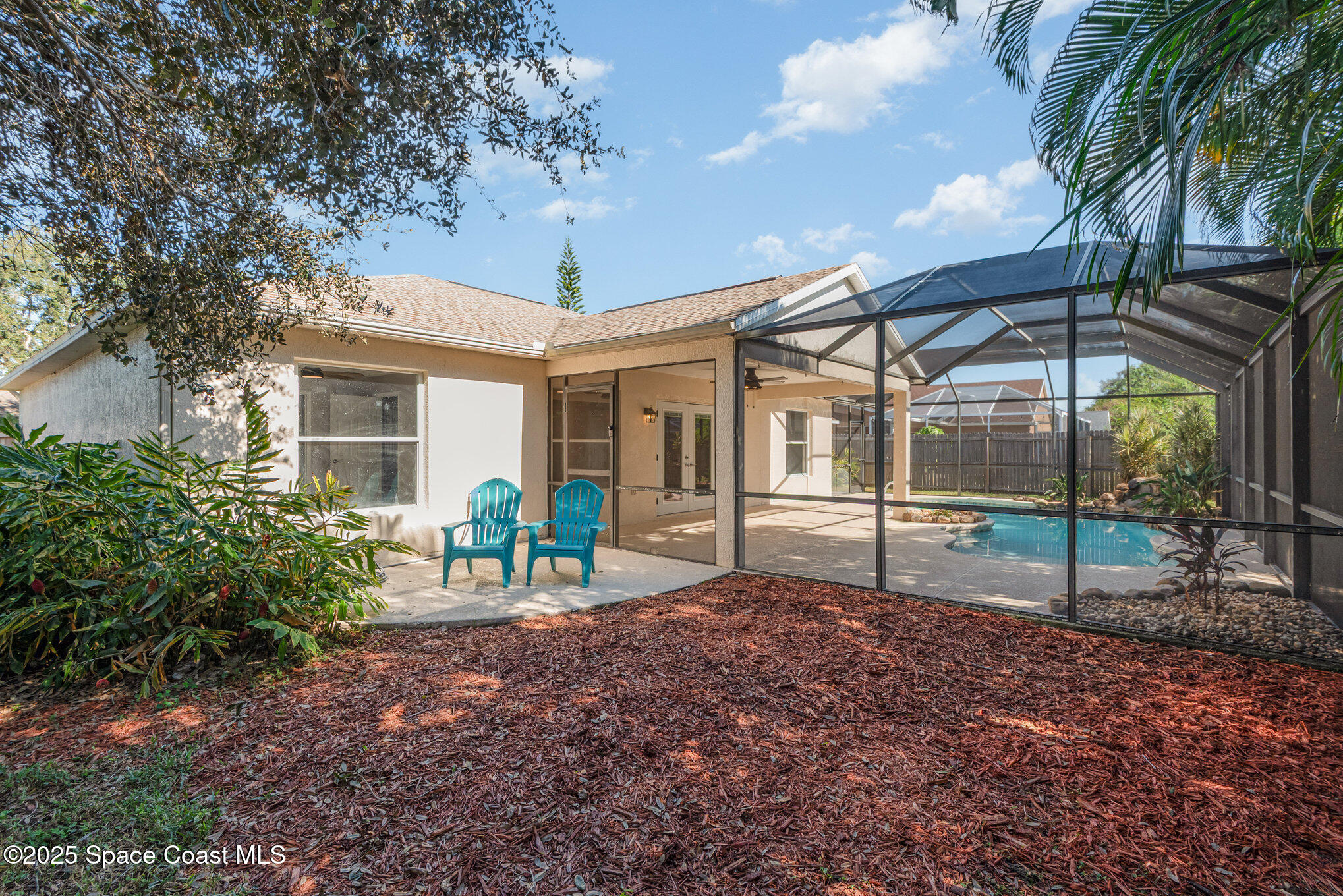 1045 Jacaranda Circle Rockledge, FL 32955 - Photo 25 of 32 a house view with a backyard space