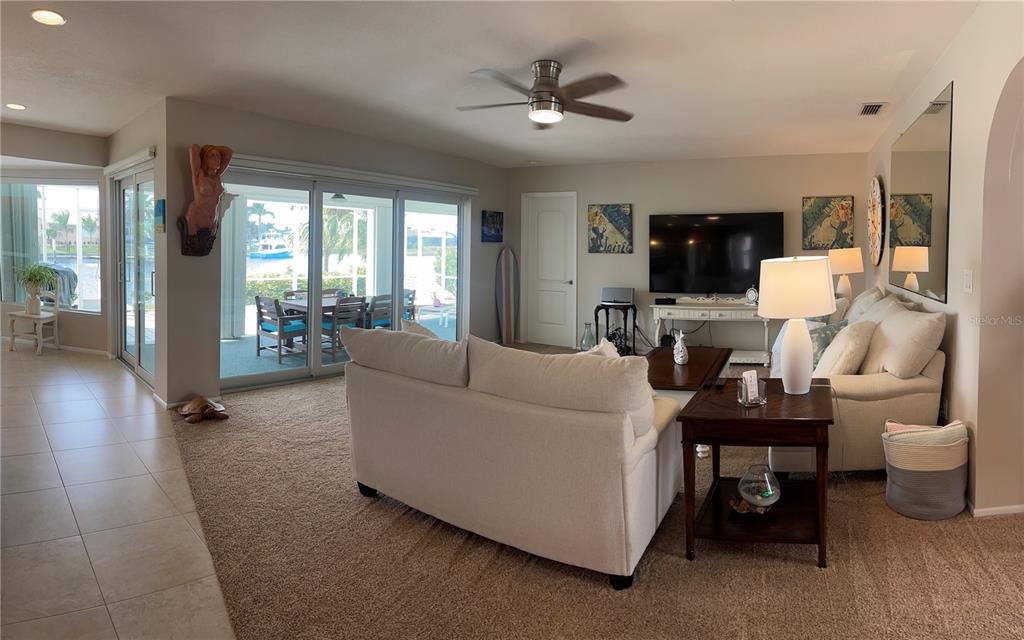3433 Nighthawk Court Punta Gorda, FL 33950 - Photo 11 of 21 a living room with furniture and a large window