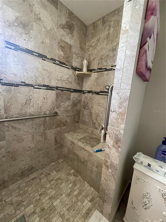 3433 Nighthawk Court Punta Gorda, FL 33950 - Photo 18 of 21 a bathroom with a shower