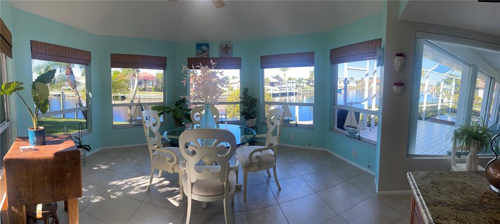 3433 Nighthawk Court Punta Gorda, FL 33950 - Photo 10 of 21 a view of a dining room with furniture window and outside view